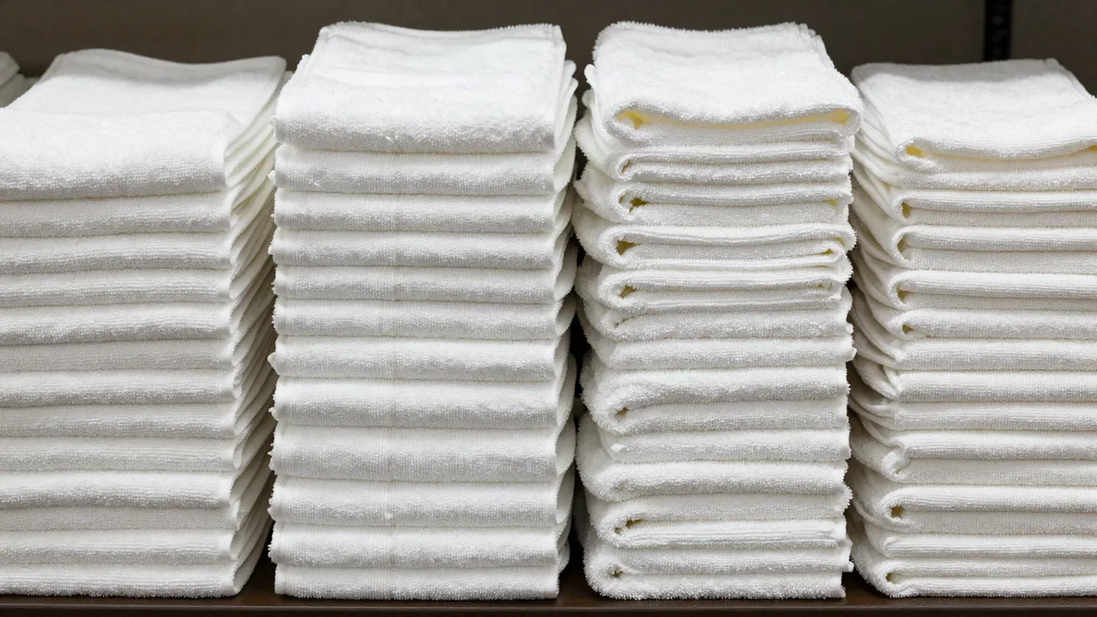 Commercial laundry facility illustrating Rental vs In-House OPL When Owning