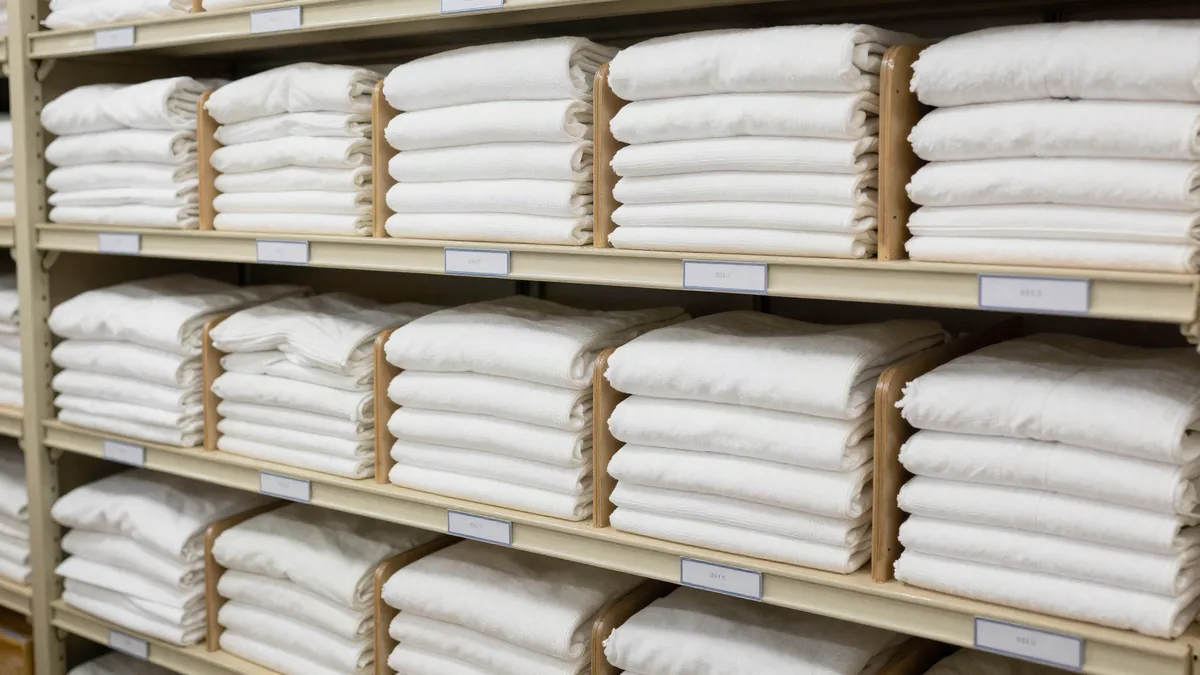 Commercial laundry facility illustrating Reject Rates Stain Rates Quality Audits